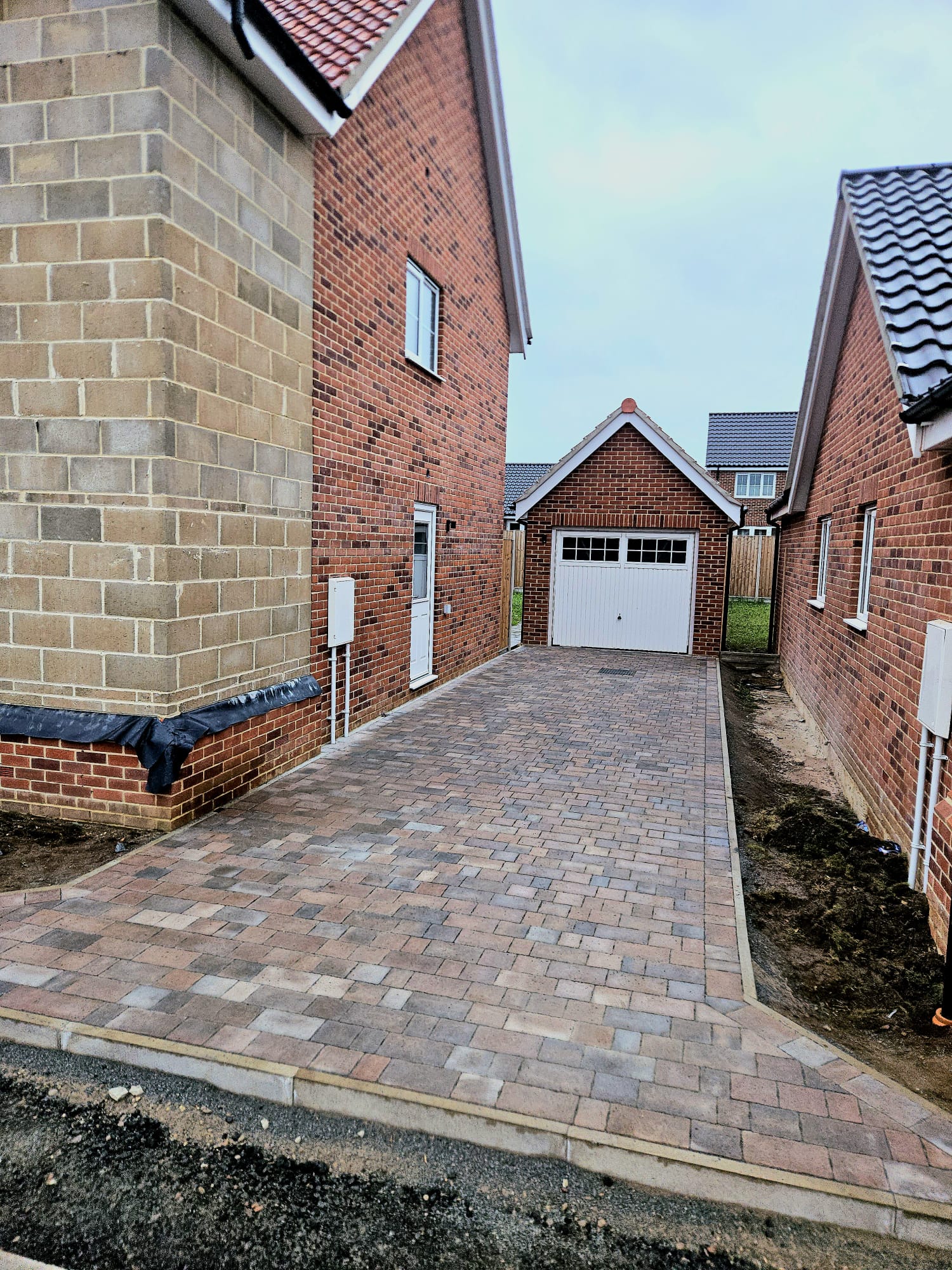 Block paved driveway with disabled access ramp